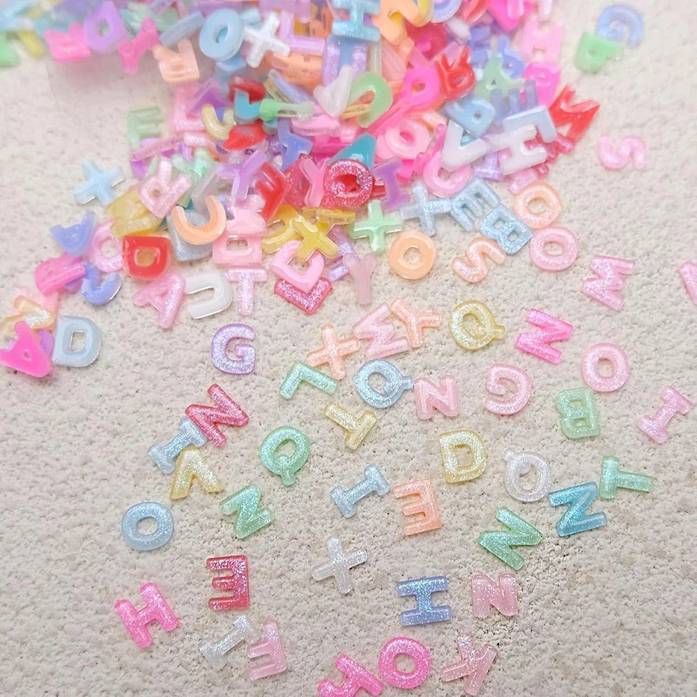 100pcs Mix Letter Nail Art Charms Candy Color with Glitter Resin Nail Rhinestones Kawaii Flatback Alphabet DIY Craft Supplies