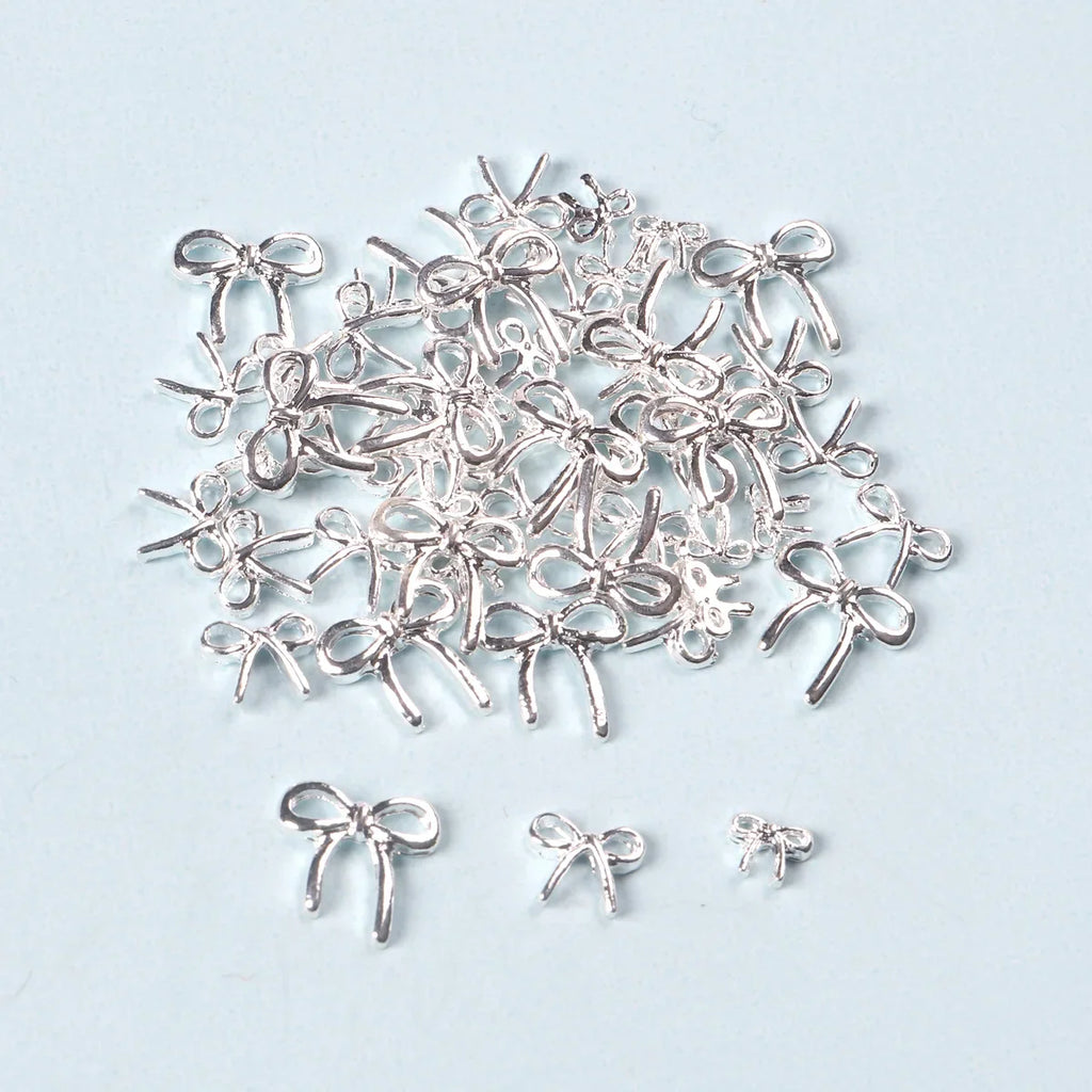 50pcs Mix Size Silver Bow Korea Style Nail Art Charms 3D Nail Decoration Bowknot Nail Accessories DIY Design