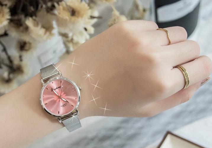Women's Stylish Elegant Watch With Braided Steel Bracelet With Shiny Background Unique Design Perfect Gif